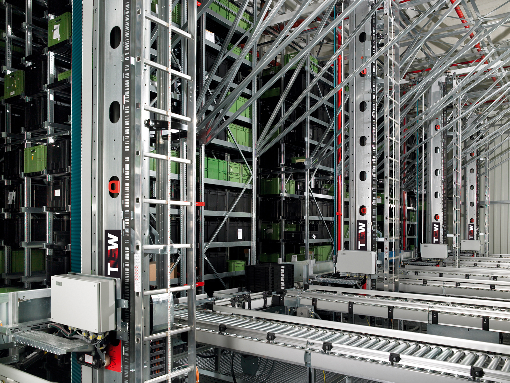 A 2007 automated storage and retrieval system installation for electronic components, the same broad class of rack-based retrieval machine as the transfer vehicle at Ford's 1979 Flat Rock plant.