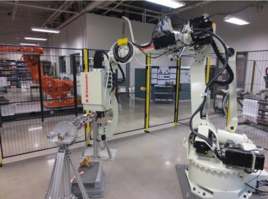 A refill friction stir spot welding robot developed and installed by Kawasaki Heavy Industries at Wichita State University, exemplifying the type of Kawasaki industrial robotic systems used in manufacturing and processing environments.