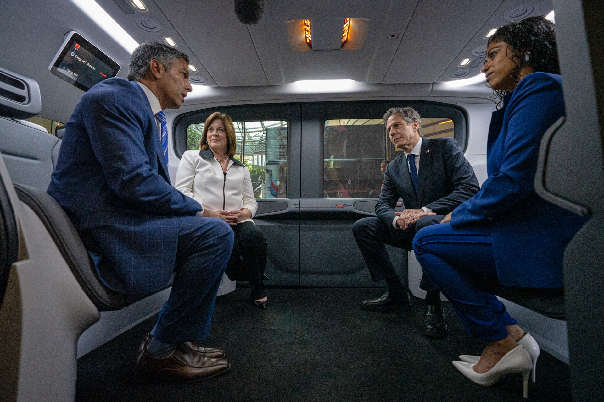 Secretary of State Antony Blinken examines a GM-Cruise autonomous vehicle at the 2022 CEO Summit of the Americas, showing the Cruise robotaxi technology at the center of the incident.